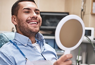 Man smiling at the dentist