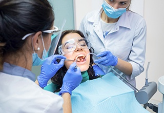 Woman undergoing a dental procedure