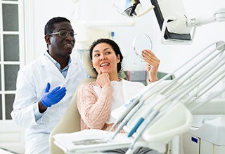 Woman smiling at the dentist